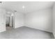 Spacious bedroom features neutral carpeting and ample natural light from the doorway, perfect for relaxation at 5210 Marshelder, Apopka, FL 32712