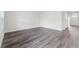 Spacious living room with neutral walls, hard surface flooring and plenty of natural light at 5210 Marshelder, Apopka, FL 32712