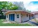 Exterior backyard view with sliding glass door and walkway at 530 Webster St, Lake Mary, FL 32746