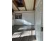 Bedroom with ample natural light, wood beamed ceilings, and closet at 530 Webster St, Lake Mary, FL 32746