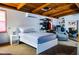 Stylish bedroom with wood ceilings, modern bed, and organized closet creates a comfortable retreat at 530 Webster St, Lake Mary, FL 32746