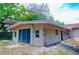 The house exterior features stucco walls, sliding glass doors, and a cozy backyard space, perfect for outdoor relaxation at 530 Webster St, Lake Mary, FL 32746