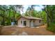 Exterior view of home with sliding glass doors and fresh paint at 530 Webster St, Lake Mary, FL 32746