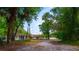 Exterior view of a home with lush tropical landscaping at 530 Webster St, Lake Mary, FL 32746