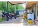 Spacious covered garage with work area and tools. Perfect space for DIY projects and motorcycle parking at 530 Webster St, Lake Mary, FL 32746