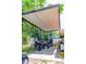 Large covered parking area provides ample space for vehicles, equipment, and storage, extending into backyard at 530 Webster St, Lake Mary, FL 32746