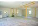 Open-concept living space with newly-framed walls offers endless possibilities for design and renovation projects at 530 Webster St, Lake Mary, FL 32746