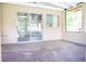 Enclosed patio with sliding glass doors, offering a versatile indoor-outdoor space for relaxation at 530 Webster St, Lake Mary, FL 32746