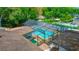 View of an enclosed in ground pool from roof top at 530 Webster St, Lake Mary, FL 32746