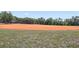 Well-maintained baseball field with dirt infield and grassy outfield at 611 Casa Park A Ct, Winter Springs, FL 32708
