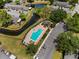 A beautiful aerial view of the community pool, hot tub, gazebo, and parking at 611 Casa Park A Ct, Winter Springs, FL 32708