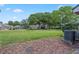 The well-manicured backyard provides ample space for outdoor relaxation and recreation at 611 Casa Park A Ct, Winter Springs, FL 32708