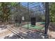 Community batting cage with well-maintained equipment for baseball practice and skill development at 611 Casa Park A Ct, Winter Springs, FL 32708