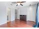 Bedroom with hardwood floors, ceiling fan, and closet for storage at 611 Casa Park A Ct, Winter Springs, FL 32708