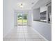 Bright dining area with tile flooring and sliding glass doors leading to the backyard at 611 Casa Park A Ct, Winter Springs, FL 32708