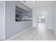 Kitchen featuring granite countertops and stainless steel appliances open to the dining area at 611 Casa Park A Ct, Winter Springs, FL 32708