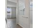 Bathroom provides a glass shower, tile floors and a window overlooking the lake at 6121 Blue Pond Way, St Cloud, FL 34771