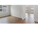 Open living space boasts wood-style tile floors and lots of natural light from the large window overlooking the yard at 6121 Blue Pond Way, St Cloud, FL 34771