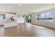Bright, open floor plan with tile flooring, recessed lighting, and views of the backyard lake at 6121 Blue Pond Way, St Cloud, FL 34771