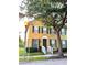 Inviting two-story home exterior featuring a well-maintained lawn, a welcoming entrance and manicured landscaping at 6258 Westcott Cove Blvd, Orlando, FL 32829
