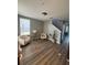 Inviting living room with neutral colors and modern wood-look flooring at 6258 Westcott Cove Blvd, Orlando, FL 32829