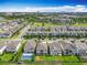 Stunning aerial view of the community with a pool, showcasing its convenient location and neighborhood layout at 7398 Alpine Butterfly Ln, Orlando, FL 32819