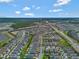 Expansive aerial view of Encore Resort featuring luxurious homes, mature landscaping, and community amenities at 7564 Marker Ave, Kissimmee, FL 34747