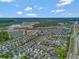 Expansive aerial view of Encore Resort featuring luxurious homes, mature landscaping, and community amenities at 7564 Marker Ave, Kissimmee, FL 34747