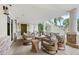 Charming outdoor patio area with comfortable seating, perfect for relaxing and enjoying the resort's ambiance at 7564 Marker Ave, Kissimmee, FL 34747