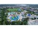 Vibrant aerial view of the waterpark at Encore Resort, showcasing slides, pools, and Gathering fun at 7564 Marker Ave, Kissimmee, FL 34747