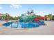 Fun waterpark area featuring slides, sprinklers, and splash zones for Gathering entertainment at Encore Resort at 7564 Marker Ave, Kissimmee, FL 34747