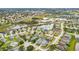 Aerial view of the neighborhood, showing many single Gathering homes at 7905 Golden Pond Cir, Kissimmee, FL 34747
