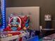 Vibrant bedroom with fun superhero-themed bedding and decor, perfect for imaginative play at 7905 Golden Pond Cir, Kissimmee, FL 34747