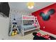 Whimsical bedroom featuring a bunk bed, Mickey Mouse decor and tile floors at 7905 Golden Pond Cir, Kissimmee, FL 34747
