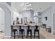 Open concept kitchen with granite countertops, pendant lighting and tile floors at 7905 Golden Pond Cir, Kissimmee, FL 34747