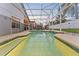 Screened-in pool with views of the fenced-in backyard at 7905 Golden Pond Cir, Kissimmee, FL 34747