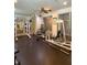 Community gym featuring weight machines, mirrors, and ceiling fan for a complete workout space at 860 N Orange Ave # 428, Orlando, FL 32801