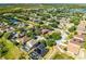 Aerial view of home showcasing landscaping and surrounding neighborhood at 1007 Golf View Estates Dr, Orange City, FL 32763