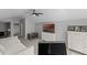 Bright bedroom with TV, dresser, and ceiling fan at 1007 Golf View Estates Dr, Orange City, FL 32763
