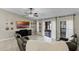 Comfortable living room features neutral paint, tile flooring, and access to the patio at 1007 Golf View Estates Dr, Orange City, FL 32763
