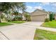 This charming home has mature landscaping and a two car garage at 10222 Marsh Pine Cir, Orlando, FL 32832