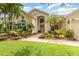 Attractive single-story home with lovely front yard landscaping at 10222 Marsh Pine Cir, Orlando, FL 32832