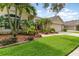 Beautiful landscaping surrounds this well maintained home at 10222 Marsh Pine Cir, Orlando, FL 32832