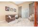 Relaxing living room with natural light, plush seating, and refined décor, creating a welcoming space at 10222 Marsh Pine Cir, Orlando, FL 32832