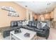 Open concept living room and kitchen area with view of the kitchen at 10222 Marsh Pine Cir, Orlando, FL 32832