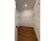 A walk-in closet with wooden floors and wire shelving at 1043 Gloryland Ct, Sanford, FL 32771