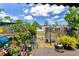 Backyard with potted plants, small ornamental details, and a fenced perimeter at 108 Orion Way, Sanford, FL 32773