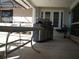 Covered patio with a grill, perfect for outdoor dining and entertaining at 11624 Delmar Ave, Orlando, FL 32836