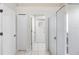Bathroom featuring tiled floors, a walk-in shower, and neutral color palette at 12543 Waterhaven Cir, Orlando, FL 32828