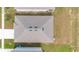 High-angle shot of a home's roof, showing features like its vents, condition, and overall structure at 1312 Sugarwood St, Davenport, FL 33837